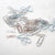 Exclusive RAD AND HUNGRY Metal Paper Clips Collection featuring paperclips locally sourced from around the world